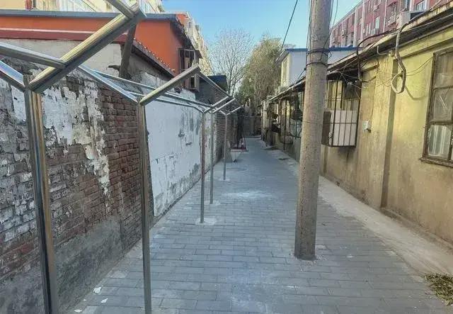 乱建居民想提升小区环境的愿望实现了凯发k8国际拆除700平方米私搭(图8)